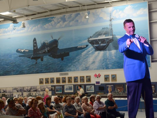 Singer Frank DiSalvo, well-known in the Coachella Valley for his impression of Frank Sinatra, performs at the Palm Springs Air Museum in a special "Tribute to the Troops" show. (Photo: Bill Marchese / Special to The Desert Sun)